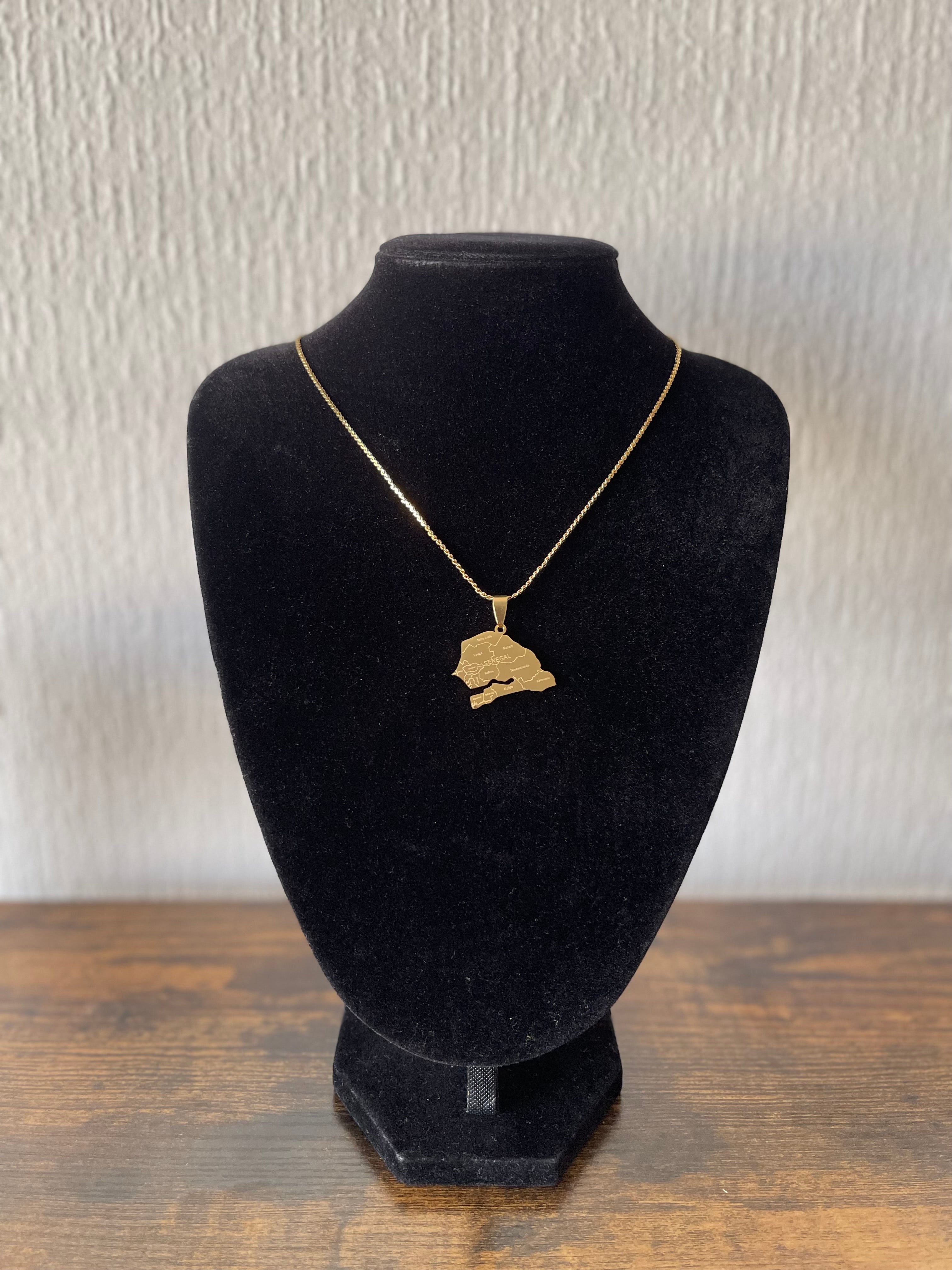 18k gold plated SENEGAL golden necklace on display stand, 50 cm chain, water-resistant.