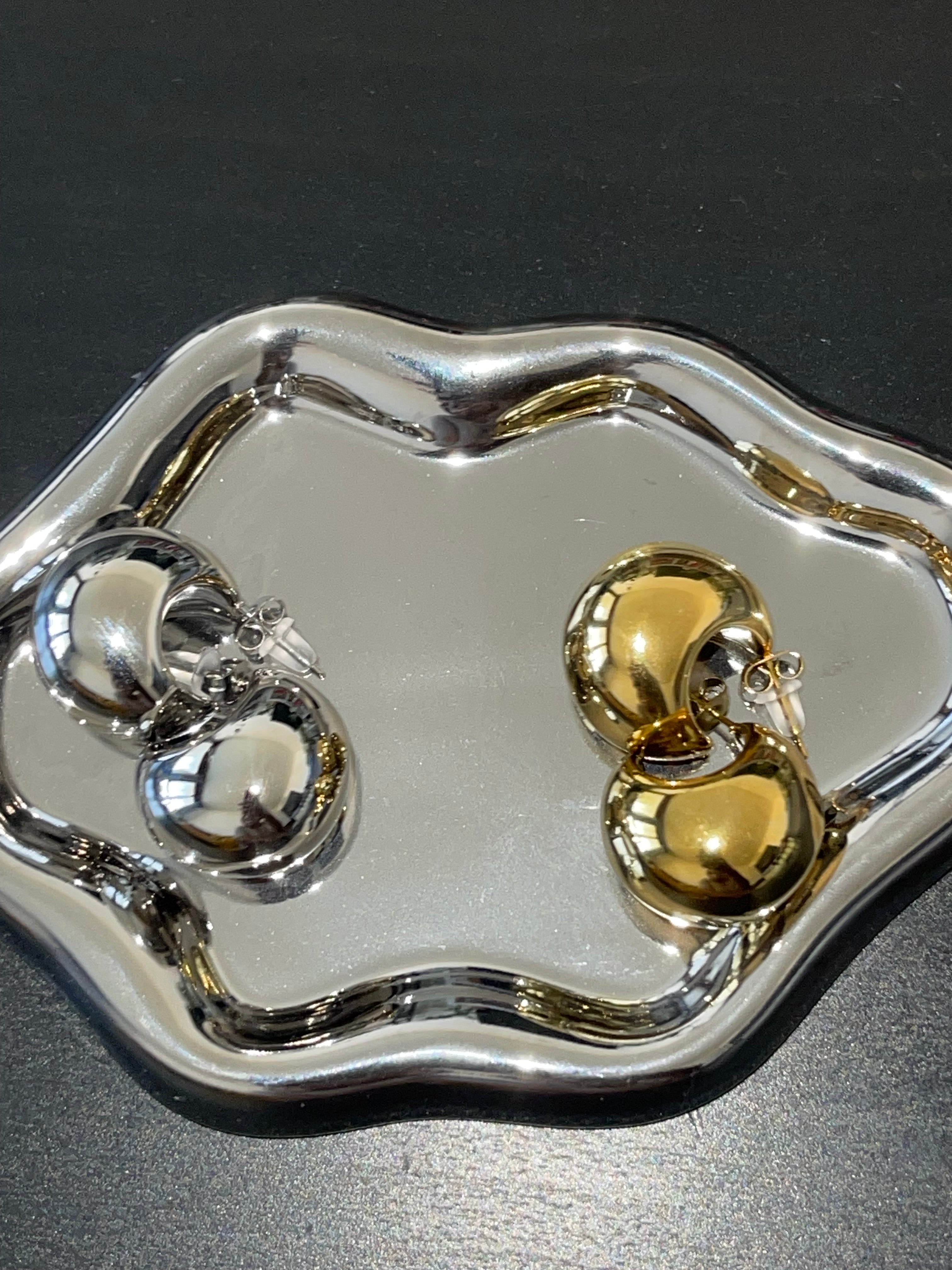 KELLY earrings gold and silver plated dome studs with high-polish mirror shine on reflective tray