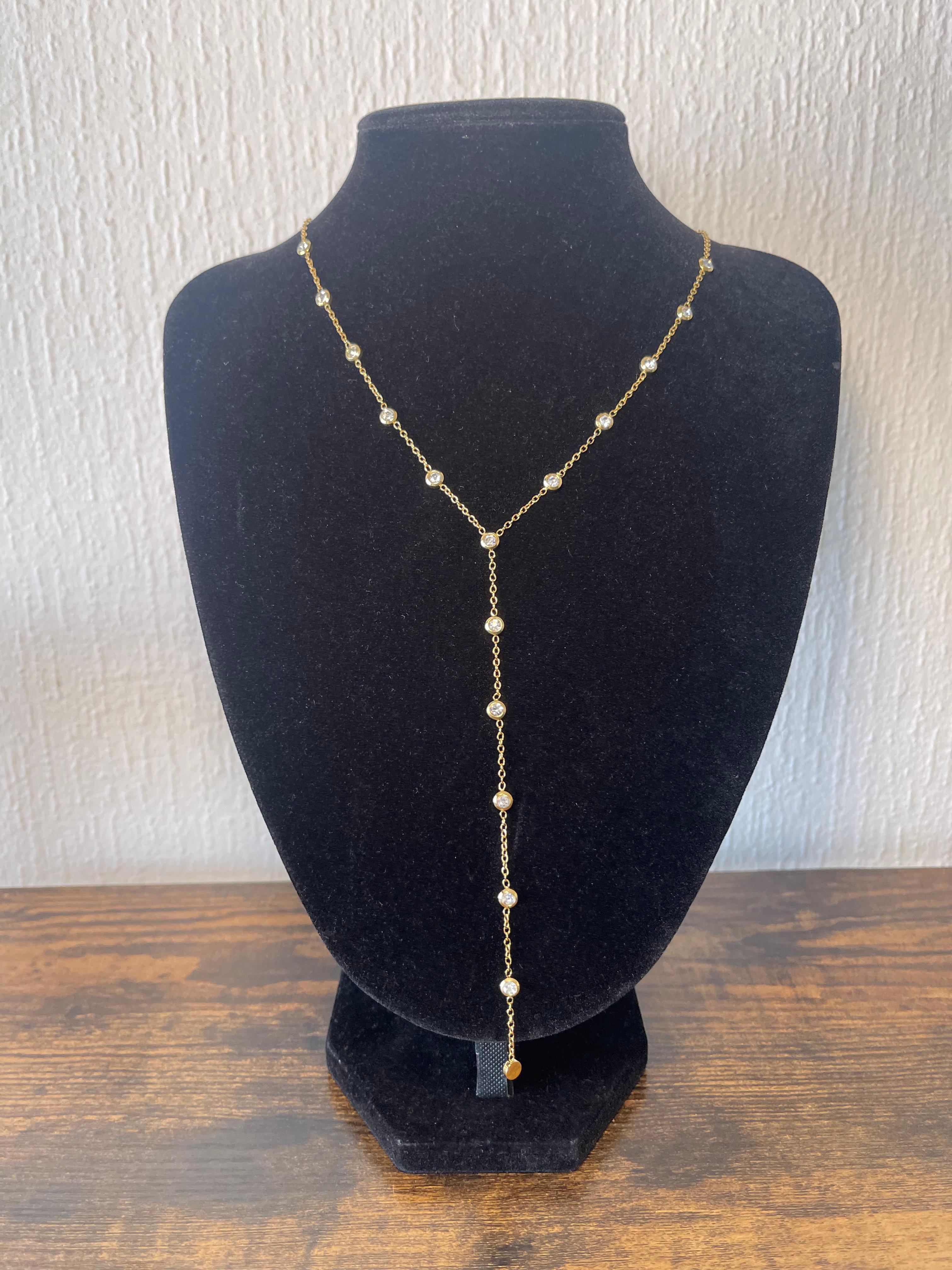 LAURA sparkling Y-necklace with 18k gold plating and delicate Y-drop design on black jewelry display