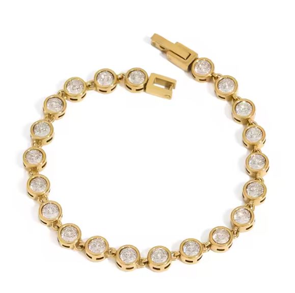 Clarisse Tennis Bracelet with 18k gold-plated stainless steel and round bezel-set cubic zirconia stones in a polished gold link design with secure box clasp.