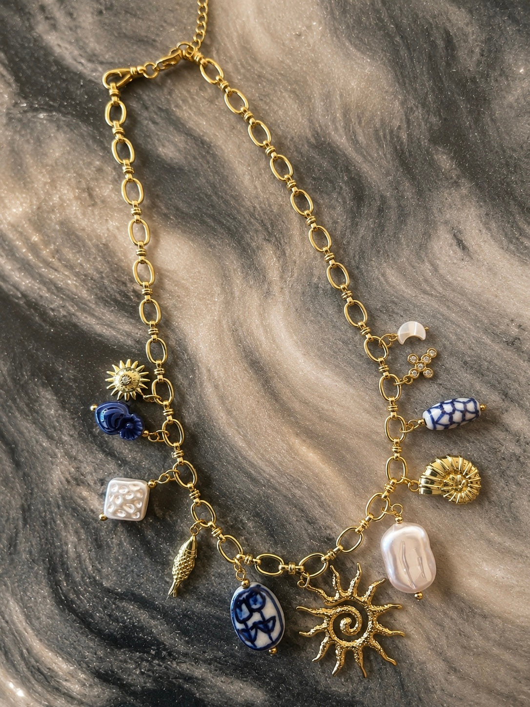 SOLÈNE Necklace gold charm necklace with ocean-inspired pearls and blue ceramic accents